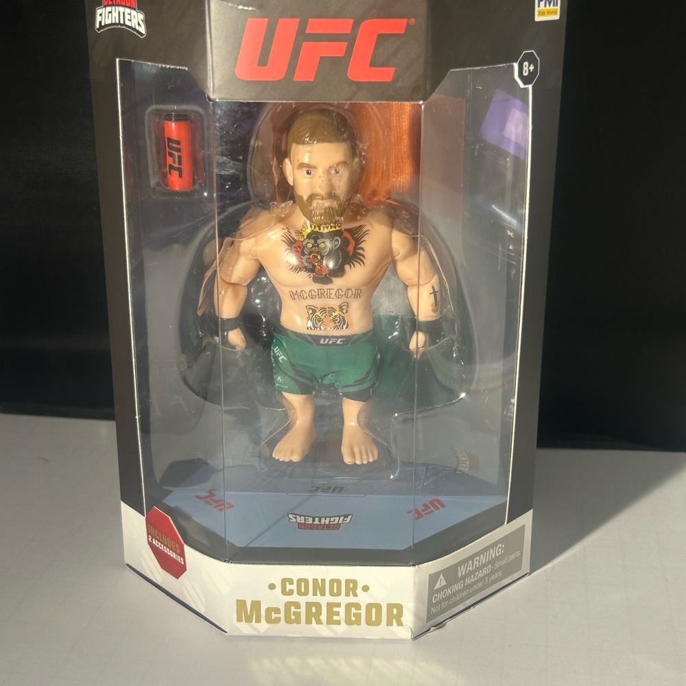 McGregor Gold and White Branded Figure Packaging